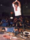 Raven getting nailed with plunder by Terry Funk